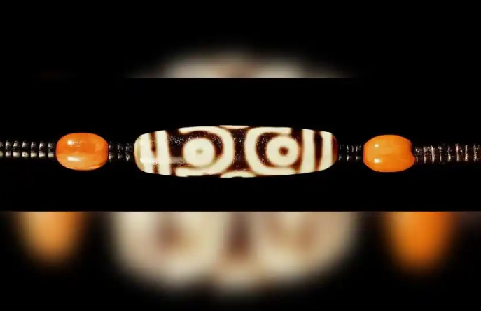 The Mystique and Legacy of Tibetan Dzi Beads: Origins, Craftsmanship, and Cultural Significance